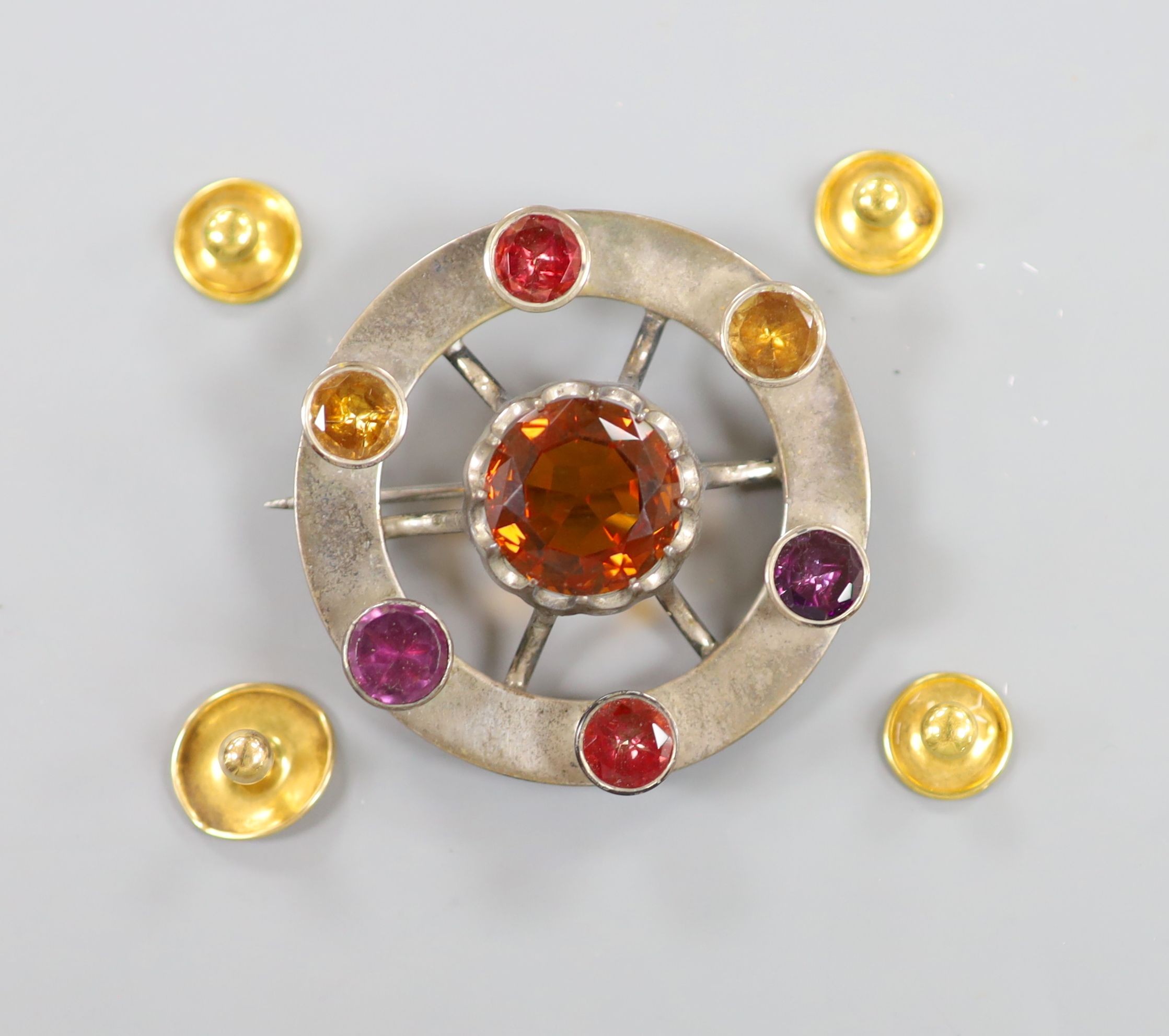 A Scottish? white metal and gem set brooch, 50mm and four yellow metal dress studs stamped 18, 3.4 grams.